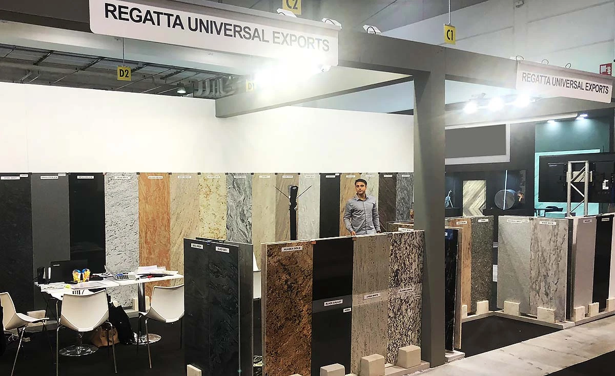 (Regatta booth displaying natural stone products to visitors)